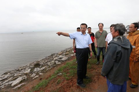 30小时转战3省察看防汛：10图回放总理汛区罕见瞬间