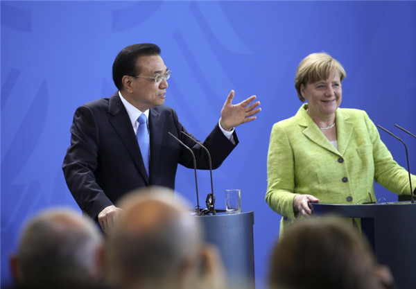 李克强说服默克尔公开表态：德国支持欧盟履行中国入世议定书第15条义务