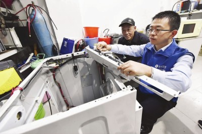 【中国梦实践者】“倒贴钱”做维修 他从空调安装工变身创业老板