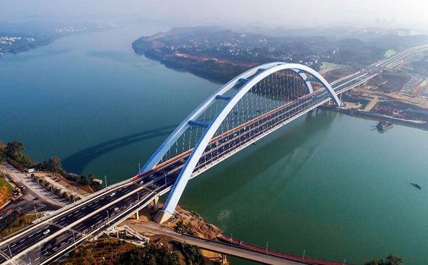 【中国梦·实践者】世界第一大有推力钢箱拱桥建成通车