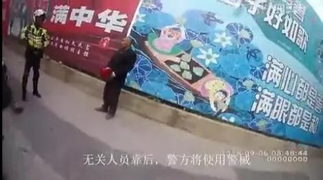 男子掏刀向交警捅去之后…这段执法视频火了！